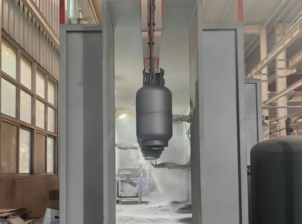Ligne de rev&ecirc;tement en poudre &eacute;lectrostatique pour bouteilles de GPL